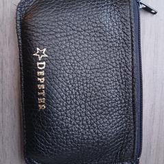 Portemonnee, som rapportert til iLost