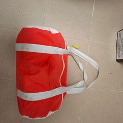 Saco Corail (rose/orange) de forme polochon, como reportado por ilévia utilizando o iLost