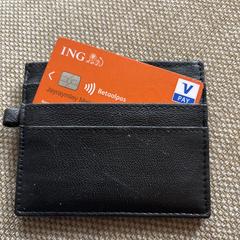 Zwarte portemonnee, som rapporterats till iLost