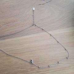 Zilveren ketting, iLost에 보고됨