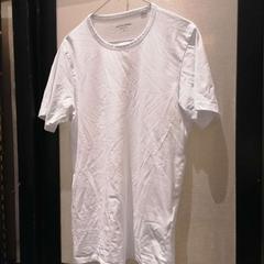 T-shirt white, rapporterat av The Dominican med iLost