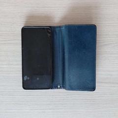 Gsm in hoesje Zwart, gisa salatu by Regio Oost-Vlaanderen iLost erabiliz