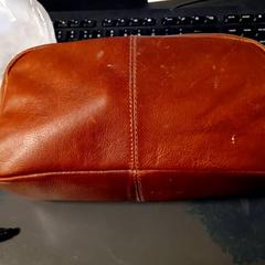 Sac & Trousse de toilette Bruine leerg, a été signalé par Van der Valk Hotel Sneek utilisant iLost