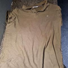 Camisa Calvin Klein, segundo informou Van der Valk Hotel Wolvega Heerenveen usando iLost