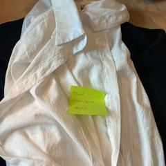 Blusa, segundo informou Amsterdam ID Aparthotel usando iLost