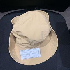 Hat Beige, as reported by The Dominican using iLost