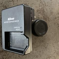 Batterij oplader en Lensdop, segons s'ha informat a iLost
