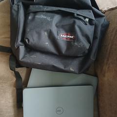 Zwarte Eastpak rugtas met twee laptops, come riportato a iLost