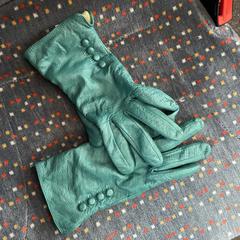 Turquoise leren handschoenen an iLost gemeldet