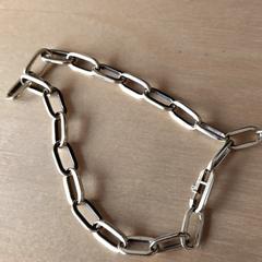 Armband met munt, som rapportert til iLost