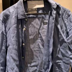 Chemise Blue, a été signalé par The Dominican utilisant iLost