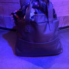 Bags black, as reported by Club Nyx/Exit Café using iLost