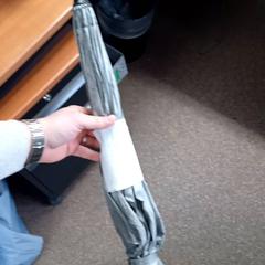 Paraguas - grijs, ha sido reportado por Centraal magazijn con iLost