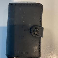 Pasjeshouder Op naam van Machado, zgłoszono przez Gemeente Amsterdam przy użyciu iLost