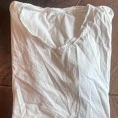 T shirt Öts, segundo informou Hotel Apeldoorn usando iLost