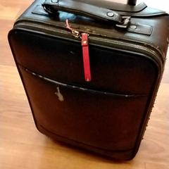 Kufr, jak nahlášeno GVB pomocí iLost