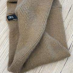 Kendő Zara bruin, amint azt Pathé Delft az iLost segítségével jelentette.