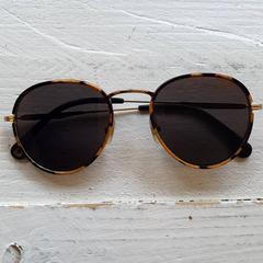 Eguzkitako betaurrekoak Gevlekt bruin/zwart montuur, gisa salatu by DierenPark Amersfoort iLost erabiliz