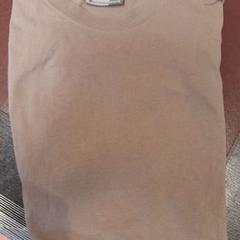 Teeshirt marron clair, ha sido reportado por TCL con iLost