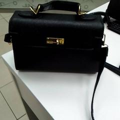 Sac à main à main, a été signalé par ilévia utilisant iLost