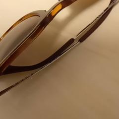 Sunglasses Brown, as reported by Mövenpick Hotel Amsterdam City Centre using iLost