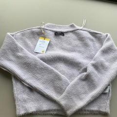 Pulóver trui gilet lila, amint azt Regio West-Vlaanderen az iLost segítségével jelentette.