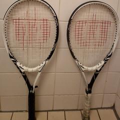 2 zwart witte Wilson tennisrackets, ha sido reportado a iLost