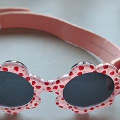 Solglasögon, rapporterat av Madurodam med iLost