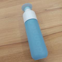 Wit - lichtblauwe Dopper drinkfles, as reported to iLost
