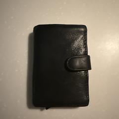 Portemonnee, som rapportert til iLost