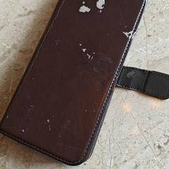 Mobiele telefoon, Android, bruine hoes, gerapporteerd met iLost