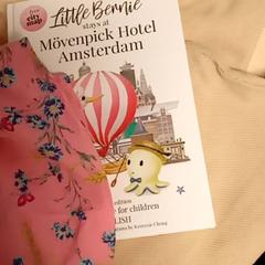 كنزة صوفية Beige، كما تم الإبلاغ عنه بواسطة Mövenpick Hotel Amsterdam City Centre عبر iLost