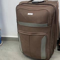 Wheeled suitcase سفر بعجلات بني, as reported by محطة بريدة (بريدة) using iLost