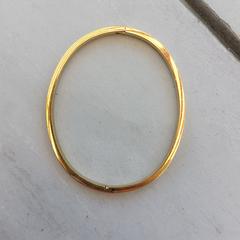 goudkleurige armband, graveringen aan buitenkant, come riportato a iLost