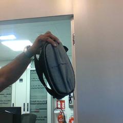 Bag travel body bag grey colour, as reported by MEININGER Hotel Milano Lambrate using iLost