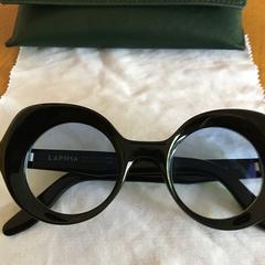 Een bril op sterkte in groene koker, som rapporterats till iLost