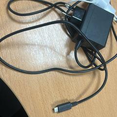 Carregador, como reportado por Sheraton Brussels Airport Hotel utilizando o iLost