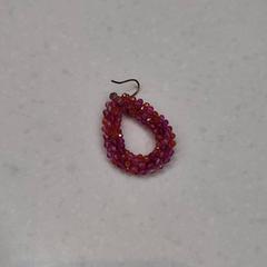 Pendiente Roze, ha sido reportado por Rijksmuseum van Oudheden con iLost