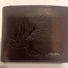 Carteira Stinis, como reportado por RAI Amsterdam utilizando o iLost