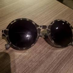 Eguzkitako betaurrekoak Grijze panterprint, gisa salatu by Van der Valk Hotel Haarlem iLost erabiliz