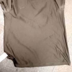 T shirt, segons ha informat Mövenpick Hotel Amsterdam City Centre mitjançant iLost