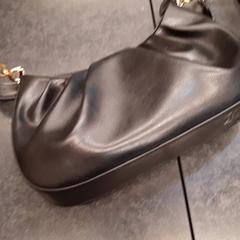 Bolsa, ha sido reportado por Rotterdam The Hague Airport con iLost