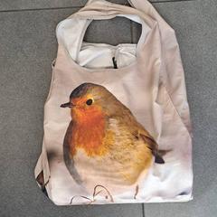 Tas me roodborstje, zoals gemeld door Regio West-Vlaanderen met iLost