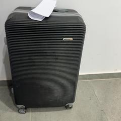Wheeled suitcase اسود, as reported by محطة بريدة (بريدة) using iLost