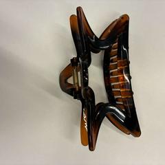 مشبك الشعر bruin، كما تم الإبلاغ عنه بواسطة Universiteitsbibliotheek Universiteitskwartier عبر iLost