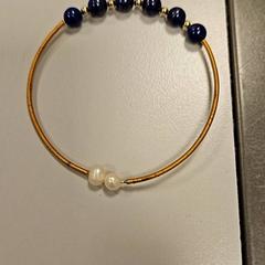 Armban d, som rapportert av Vrije Universiteit Amsterdam ved bruk av iLost