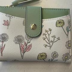 Brieftasche Bourloukas, gemeldet von HTM über iLost