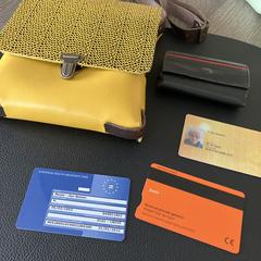 Geel handtasje, como reportado ao iLost