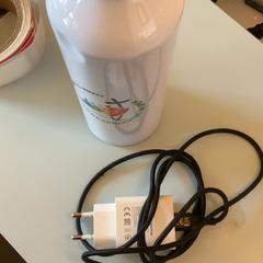 Bottle & Charger, as reported by MEININGER Hotel München City Center using iLost
