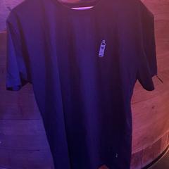 T shirt black, as reported by Club Nyx/Exit Café using iLost